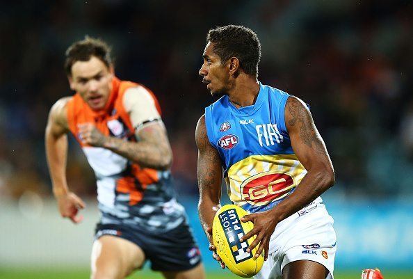 CANBERRA, AUSTRALIA - APRIL 25: Jarrod Garlett of the Suns in action during the round four AFL match between the Greater Western Sydney Giants and the Gold Coast Suns at StarTrack Oval on April 25, 2015 in Canberra, Australia. (Photo by Mark Nolan/Getty Images)
