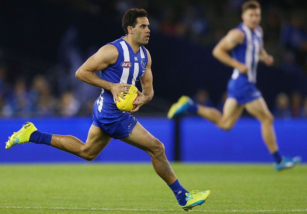 MELBOURNE, AUSTRALIA - AUGUST 27: Daniel Wells of the Kangaroos runs with the ball during the round 23 AFL match between the North Melbourne Kangaroos and the Greater Western Sydney GIants at Etihad Stadium on August 27, 2016 in Melbourne, Australia. (Photo by Michael Dodge/Getty Images)